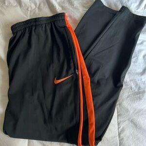 Nike Black and Orange Track Pants
